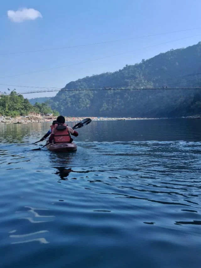 Two people doing Kayaking In Asia's Cleanest River Umngot