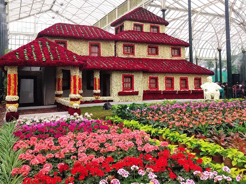 House completely decorated with flowers in Lalbagh Botanical Garden