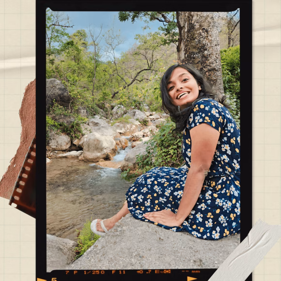 Shruti Sitting near a river in Rishikesh